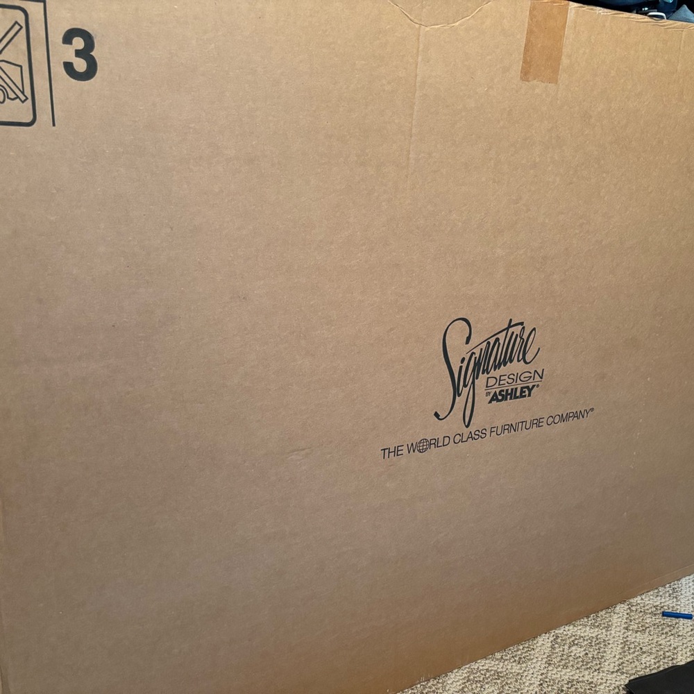 Signature Design by Ashley Furniture Box. BRAND NEW partial bedroom set.